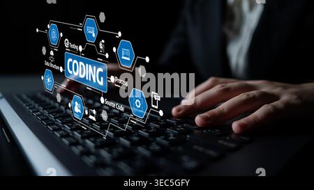 A close-up view of hands typing on a laptop keyboard, featuring a digital coding interface. Ideal for illustrating software development and technology Stock Photo