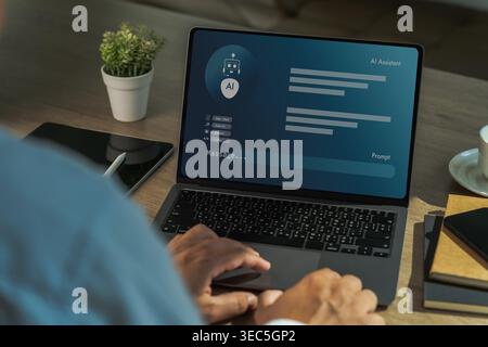 AI assistant dashboard on laptop with user typing at workspace, illustrating chatbot prompt interface, automated content generation, smart productivit Stock Photo