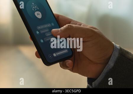 Futuristic AI assistant chat interface on smartphone held in hand, illustrating mobile customer service automation, instant support response, smart me Stock Photo