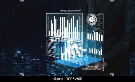 A professional man in a suit engages with a digital tablet showcasing various marketing data and analytics, set against a vibrant urban backdrop Stock Photo