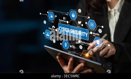 A business professional interacts with a tablet while displaying cyber security concepts, illustrating the importance of data protection and safe Stock Photo