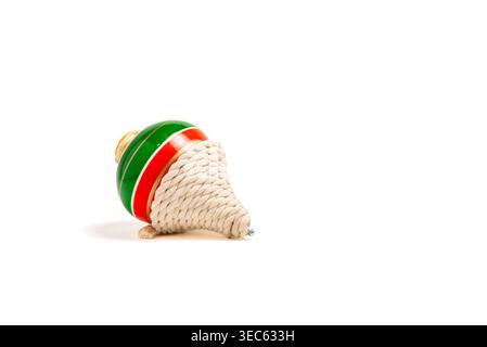 Traditional Colorful Spinning Top Toy with Rope on Isolated White Background Stock Photo