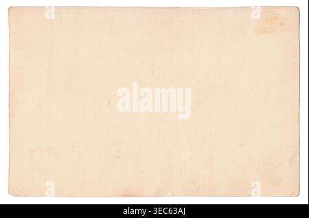 Vintage background of old ancient torn paper texture with spots. Old paper as background. Interesting texture of old yellowed paper slightly damaged Stock Photo