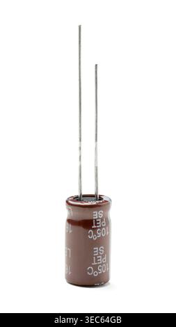 Group of electrolytic capacitors on white background. Electronic components for circuit board repair and DIY electronics. Macro shot of small black Stock Photo