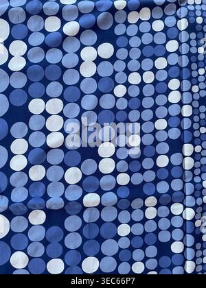 Abstract blue background with soft bokeh circles in varying sizes, creating a modern and elegant dynamic light pattern Stock Photo