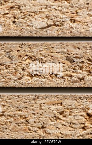 Chipboard with open edges, three chipboard slabs in a stack with coarse wood shavings and the organic texture of pressed wood chips upon detailed exam Stock Photo