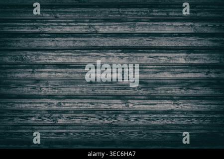 Old black knotty wood texture. Dark wooden background of rough boards Stock Photo