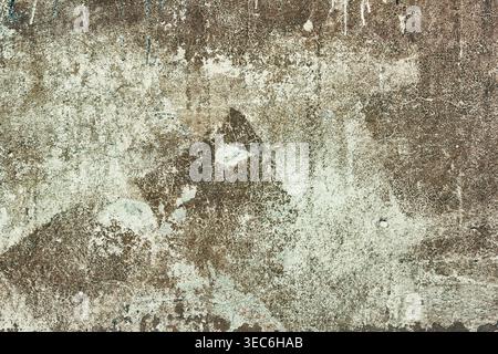 Old shabby concrete wall texture with cracked brown paint. Abstract grunge background Stock Photo