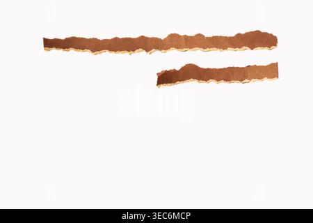 Brown craft paper strips with rough, textured edges creating horizontal lines, offering unique backdrop and design, element, white background Stock Photo