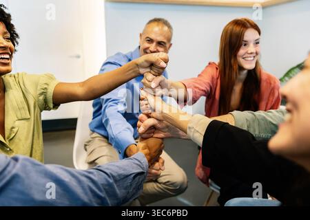 Diverse business team showing unity and collaboration Stock Photo