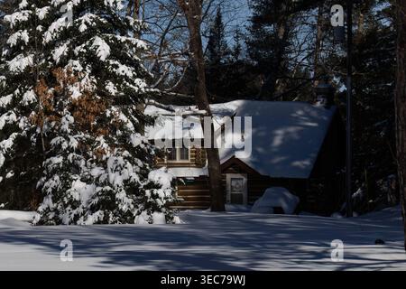 Northwoods cabin on a March morning in Clam Lake, Wisconsin. Stock Photo