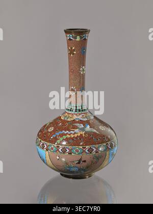 Vase, gift, Japanese art, Japanese culture, plants, butterflies, phoenixes iconography, Meiji 1868–1912, hoo phoenix, cloisonné enamel, ca. 1880 Meiji 13, Japan, vessel, height 30.5 cm, diameter 16.0 cm, A tall narrow-necked vase with a bulbous base sits against a plain neutral background; the vase shows a dominant reddish-brown ground covered with delicate swirling patterns and scattered floral motifs in white, blue, green, and yellow on the neck, a band of turquoise and black scale-like decoration at the shoulder, and richly decorated panels on the body featuring stylized birds, flowers, and Stock Photo