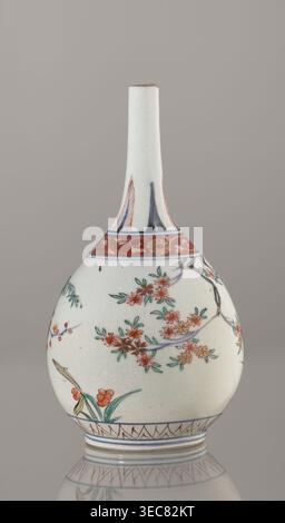 Bottle, Edo period 1603–1868, early 18th century, Japan. Porcelain sake bottle vessel, height 22.1 cm, diameter 12 cm. Decorated in the kakiemon style with a motif of the three friends of winter bamboo, plum, and pine; rock, and two borders with plant motifs and floral patterns on the neck. Materials: ceramics porcelain., A pale ceramic bottle with a long narrow neck and bulbous body sits against a neutral gray background; the surface is primarily white with painted floral motifs in red, green, blue, and touches of yellow, showing branches with clusters of red-orange blossoms and green leaves, Stock Photo