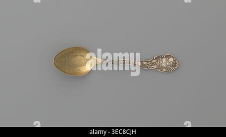 Souvenir spoon, Shepard Mfg. Co. fl. 1893–1923. Silver souvenir spoon, ovoid scoop with engraved view of buildings and the inscription JACKSONS / BIRTHPLACE / NASHVILLE / TENN. Flat handle with irregular edges made of channel sections; the inscription TENNESSEE along the handle, above which is a man with a pickaxe. The handle is widened at the end with relief depictions of a plow, a sheaf of wheat above it the Roman numeral XVI, cotton, with the inscription AGRICULTURE underneath, and a ship below with the inscription COMMERCE below — the emblems of the state of Tennessee; XVI denotes the Stock Photo