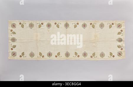 Church napkin made of thin white linen batiste edged with multicoloured embroidery. Ornament composed of large projections of stylized Eastern-style flower and fruit sprigs. Embroidered with very fine stitches along the lines of the drawing with silk thread: light celadon, light blue, turquoise, yellow-ochre, pink, burgundy, blue, dark beige, and gold thread. Embroidered motifs are arranged around the edges. The center is plain. Alternating motifs: a tulip flower in cross-section creating a stylized palmette, and a pomegranate branch with a leaf, inside which is a floral sprig. In the corners, Stock Photo