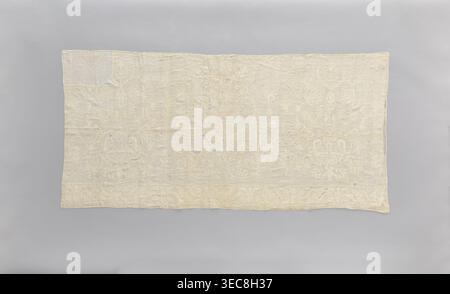 Church napkin made of white linen, covered with white, partially openwork embroidery. In the center is a large stylized flower tree; on the sides are bouquets in vases. The bottom border features a floral tendril motif, punctuated at regular intervals with a candelabra motif. Tall vases and flowers stylized in an Eastern style. Late 18th century, Poland. Fabrics; height 81 cm, width 166 cm., A rectangular textile laid flat against a neutral background, showing an embroidered pattern across its surface; the fabric appears pale cream to off-white with visible lighter embroidered motifs creating Stock Photo