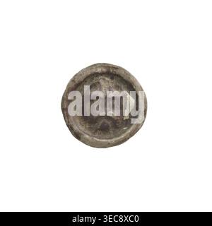 Denarius — bracteate imitation; one-sided coin featuring a gate with four rectangular openings topped by a distorted cross; under the gate vault, an arch. 13th century, State of the Teutonic Order (1226–1525). Diameter 15.7 mm, weight 0.22 g., A round, shallow object with an uneven rim showing a worn, textured surface in shades of brown, gray, green, and muted purple, with a small area of lighter, beige peeling material on one side; the interior has irregular darker patches and mottled discoloration creating a rough, pitted appearance. Stock Photo