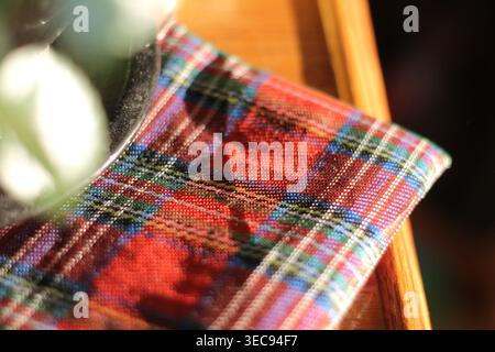Folded Red Plaid Fabric After Christmas Stock Photo