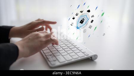 Hands Typing on a Keyboard with Digital Security Icons for Online Safety and Data Protection in a Modern Workspace Environment Quark. Stock Photo