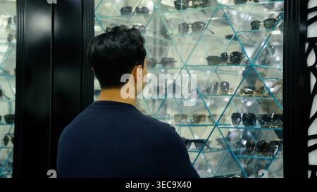 Specialist standing in high tech server room Stock Photo