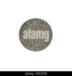 Crown six-coin, Stanisław August Poniatowski (King of Poland; 1732–1798). Obverse: Under the crown a round, three-field coat of arms with the coats of arms of Poland (Eagle), Lithuania (Pogoń) and the Poniatowski coat of arms (Ciołek); around the inscription divided by a crown: STANISLAUS AUGUUS. Reverse: Inscription in three lines: .6./GROSZY/1795 with value numerals on the sides of a rosette; pearl border. Date: 1795. Polish–Lithuanian Commonwealth (1569–1795). Coin: diameter 18.9–19.1 mm, weight 1.71 g., A round metallic object with a worn surface centered on a white background, showing Stock Photo