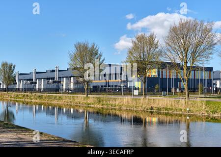 Microsoft Datacenter In Middenmeer, Netherlands, Reflecting In Canal Water, Digital Infrastructure And Technology Growth Stock Photo