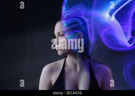 Portrait with dynamic light field representing artificial intelligence, neural networks, and cognitive processes. Stock Photo