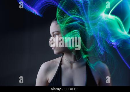 Female portrait with flowing purple waves visualizing neural signals, AI systems, and data processing. Stock Photo