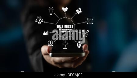 Business Connections and Relationship Building Visualized Through Mobile Technology in a Digital Age Quark. Stock Photo