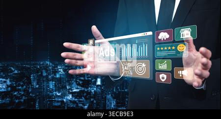 A businessman stands with hands outstretched, presenting a holographic digital interface featuring advertising metrics, analytics, and engaging visual Stock Photo