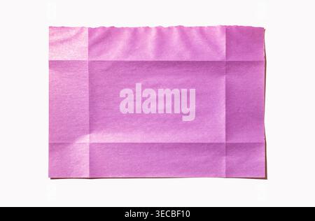 Pink tissue paper creating a textured background with creases and wrinkles, forming a rectangular shape, white background Stock Photo