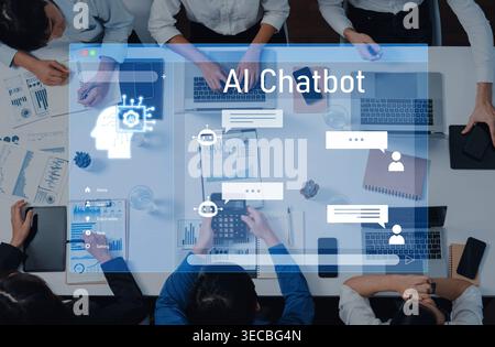This image showcases advanced AI chatbot technology being utilized in a modern workspace, emphasizing communication and collaboration among team membe Stock Photo