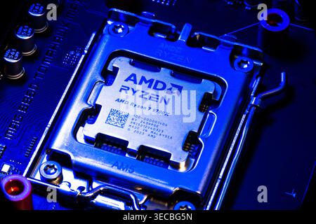 AMD Ryzen 7900x Processor Chip Installed In Cpu Socket On Computer Motherboard Stock Photo