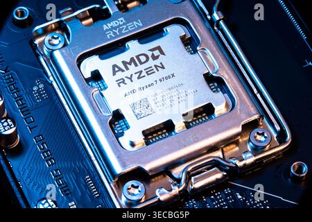 AMD Ryzen 7900x Processor Chip Installed In Cpu Socket On Computer Motherboard Stock Photo