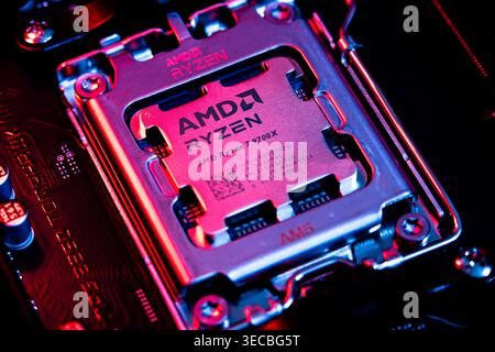 AMD Ryzen 7900x Processor Chip Installed In Cpu Socket On Computer Motherboard Stock Photo