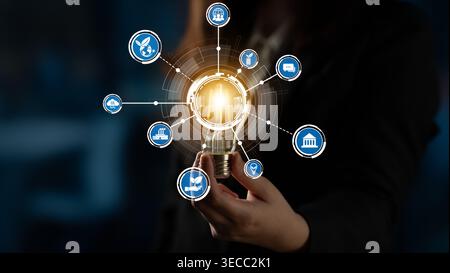 Conceptual Image of Business Innovation with Light Bulb Surrounded by Icons Representing Technology, Ideas, and Growth Opportunities in a Dynamic Sett Stock Photo