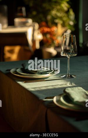 Elegant table setting with wine glass and napkin Stock Photo