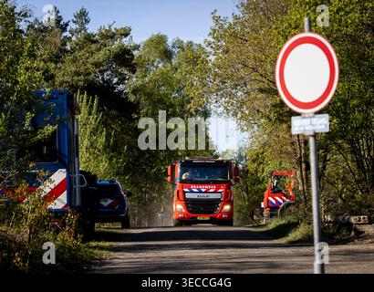 'T HARDE - Firefighters at the entrance to the military training ground near 't Harde in Gelderland, a day after the exceptionally large wildfire. The fire started during a military exercise at the shooting range. SEM VAN DER WAL / ANP netherlands out - belgium out Stock Photo