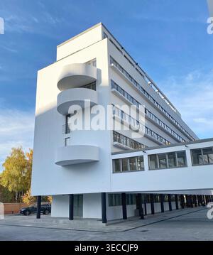 Moscow, Russia- October 9 2021: Modern white building with geometric balconies under blue sky, urban architecture, clean daylight exterior scene moder Stock Photo