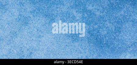 Light blue denim chambray fabric texture with fine woven surface as a background Stock Photo