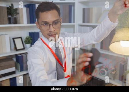 Business professional explaining ideas and planning strategy during meeting, using visual thinking to communicate concepts, solve problems and support Stock Photo