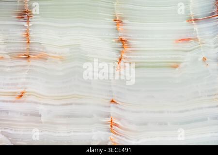 Front view of a polished light green onyx marble texture with parallel horizontal stripes Stock Photo