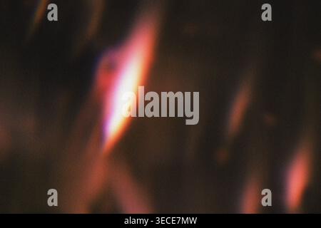 Abstract Pink Magenta and Black Grainy Texture Background with Subtle Spotlight defocused effect. High quality. Stock Photo