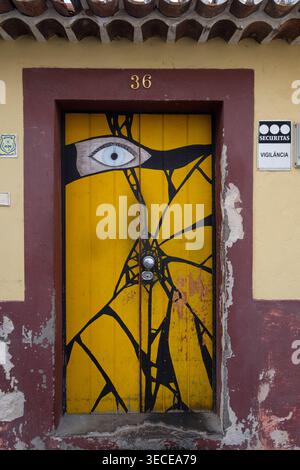 A painted door as part of The Art of Open Doors along the Rua de Santa Maria in Funchal, Madiera october 2024 Stock Photo