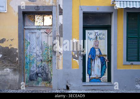 Painted doors as part of The Art of Open Doors along the Rua de Santa Maria in Funchal, Madiera october 2024 Stock Photo