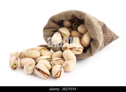 Pistachio nuts in sack isolated on white Stock Photo