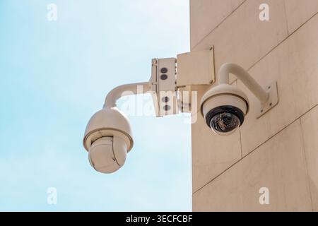 Panoramic street surveillance camera on the corner of the building. Security system Stock Photo