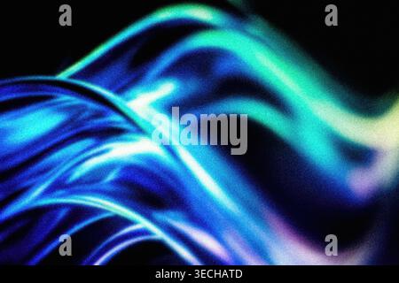 Vibrant grainy gradient overlay featuring complex swirling light waves in cyan blue and purple Stock Photo