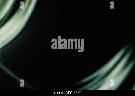 Dark background with green light leaks on edges and grainy texture Stock Photo