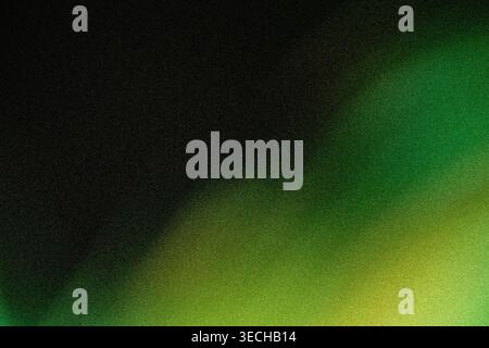 Soft diagonal light leak gradient blending from black to green and yellow with grain Stock Photo